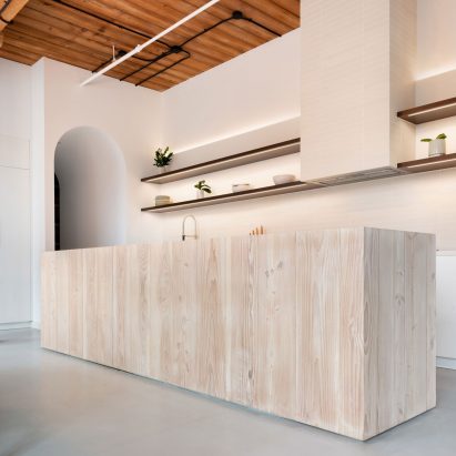 StudioAC links Candy Loft interiors with arched hallways in Toronto