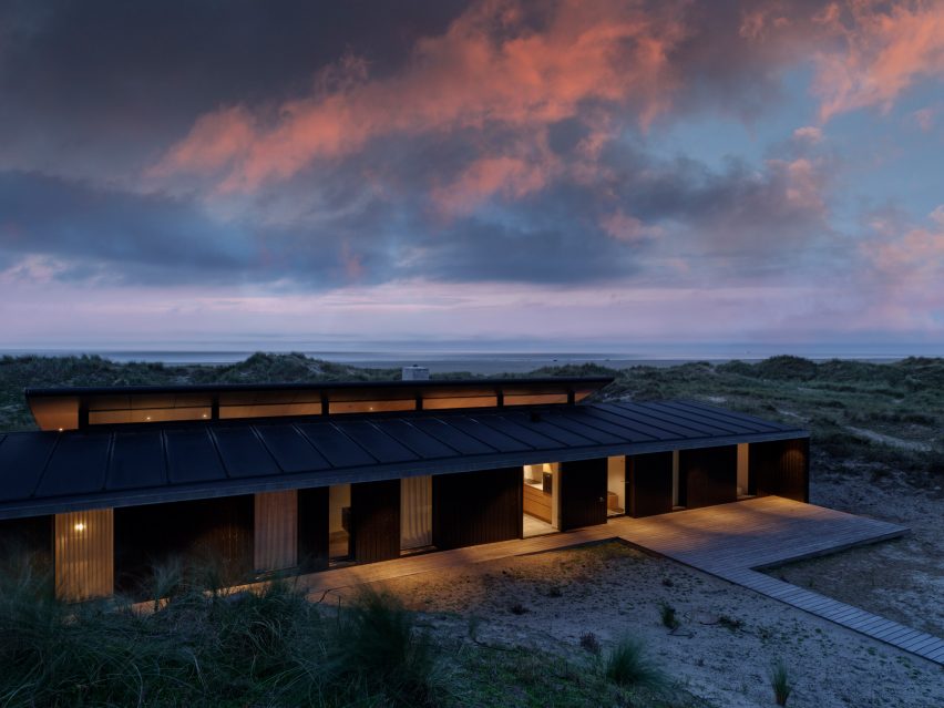 Night view of Fano House by Knud Holscher