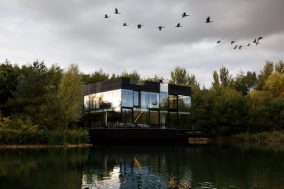 Glass Villa in the lake by Mecanoo in Lechlade, United Kingdom