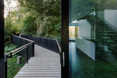 Glass Villa in the lake by Mecanoo in Lechlade, United Kingdom