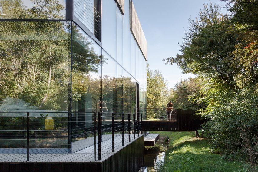 Glass Villa in the lake by Mecanoo in Lechlade, United Kingdom