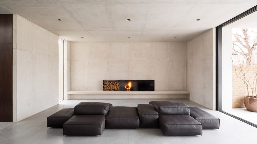 Carmody Groarke inserts concrete house inside old brick warehouse in London