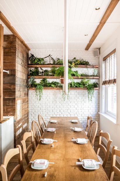 Interiors of Red Farm restaurant designed by Créme