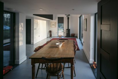 Interiors of Eastabrook Architects's corrugated metal house extension