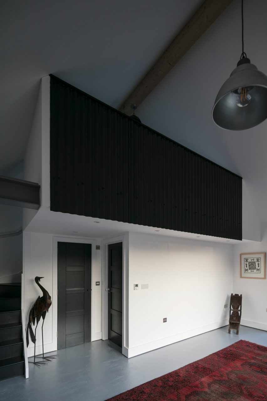Interiors of Eastabrook Architects's corrugated metal house extension