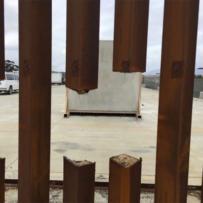 Steel-slat Mexican border prototype sliced by saw