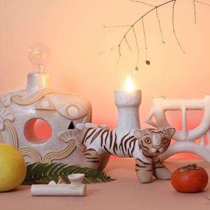 Vala Rae designs relief stoneware that references animals, plants and the evil eye