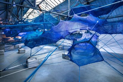 Anya Hindmarch and Numen/For Use create woven network of blue tunnels at London Fashion Week