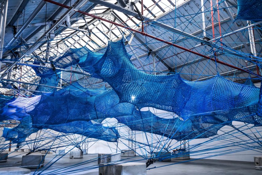 Anya Hindmarch and Numen/For Use create woven network of blue tunnels at London Fashion Week