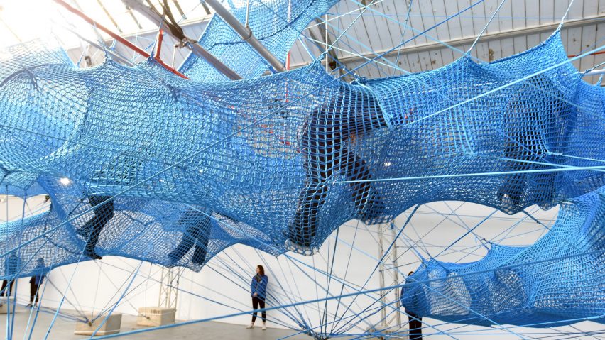 Anya Hindmarch and Numen/For Use create woven blue tunnels at London Fashion Week