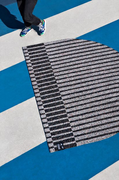 Simone Post makes rugs from recycling old Adidas trainers