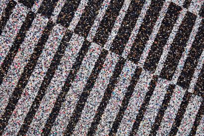 Simone Post makes rugs from recycling old Adidas trainers