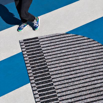 Simone Post makes rugs from recycling old Adidas trainers