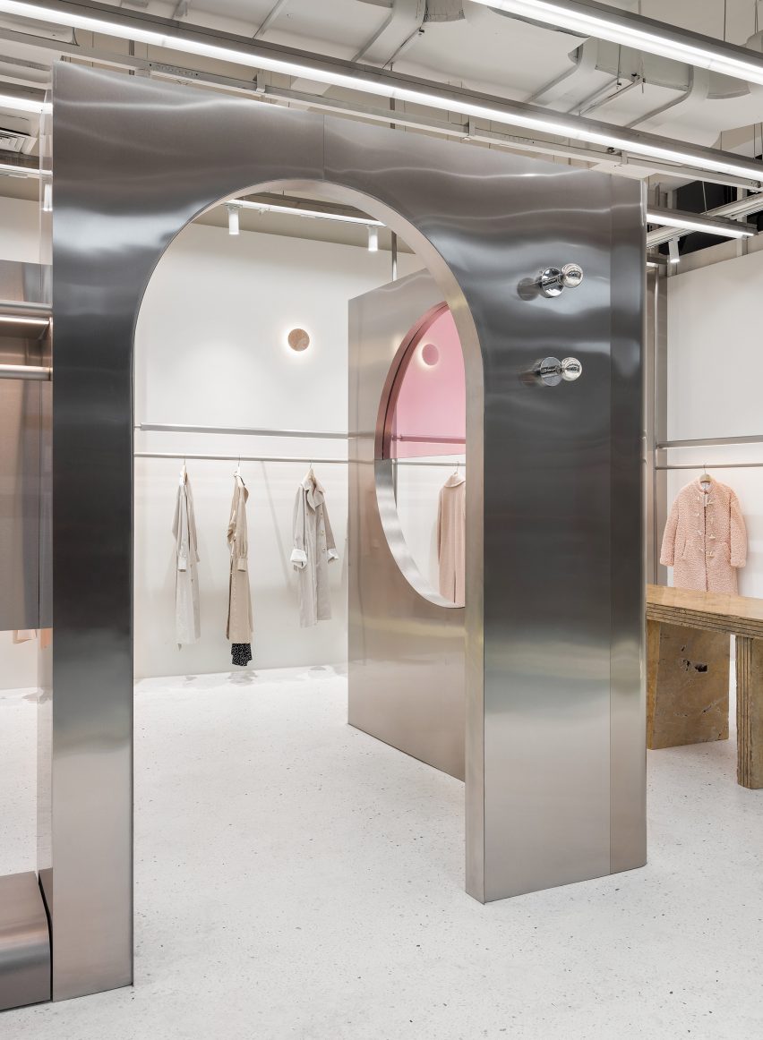 Stainless steel partition frames Wellsky fashion boutique by Xian Xiang Design