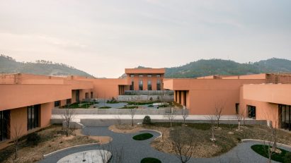 David Chipperfield's Zhejiang Museum of Natural History in China is embedded into sloping earth