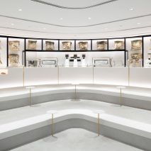 Nendo inserts stepped concrete platforms into Kuwait coffee shop