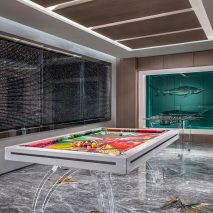 Dezeen Weekly features a Damien Hirst hotel suite and Bauhaus-style logos
