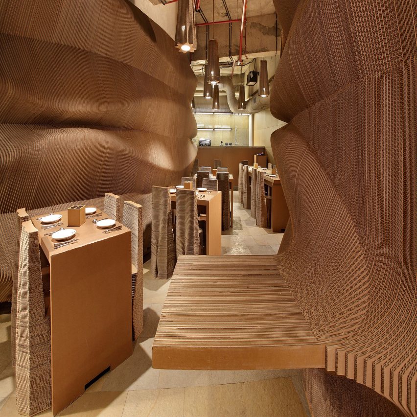 Bombay cafe by Nudes architecture office is made entirely from recycled cardboard