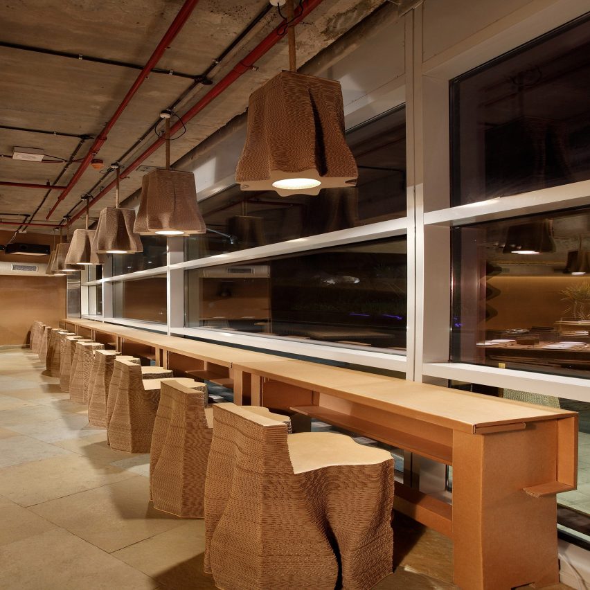 Bombay cafe by Nudes architecture office is made entirely from recycled cardboard