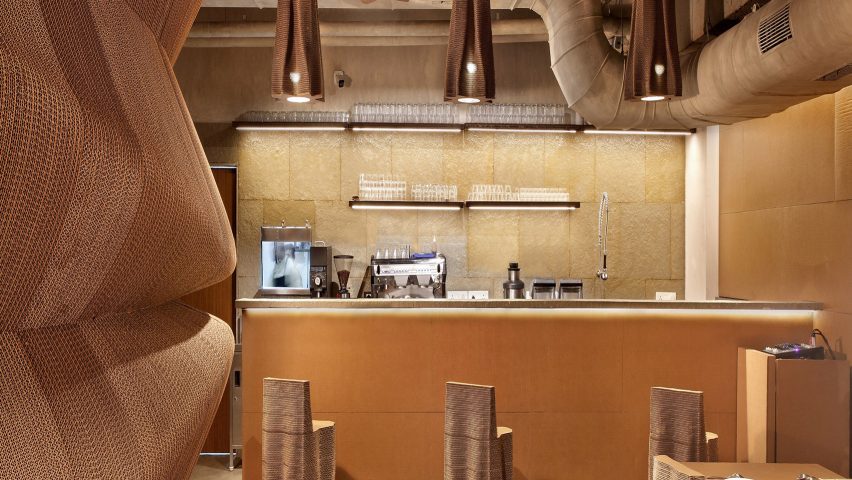 Bombay cafe by Nudes architecture office is made entirely from recycled cardboard