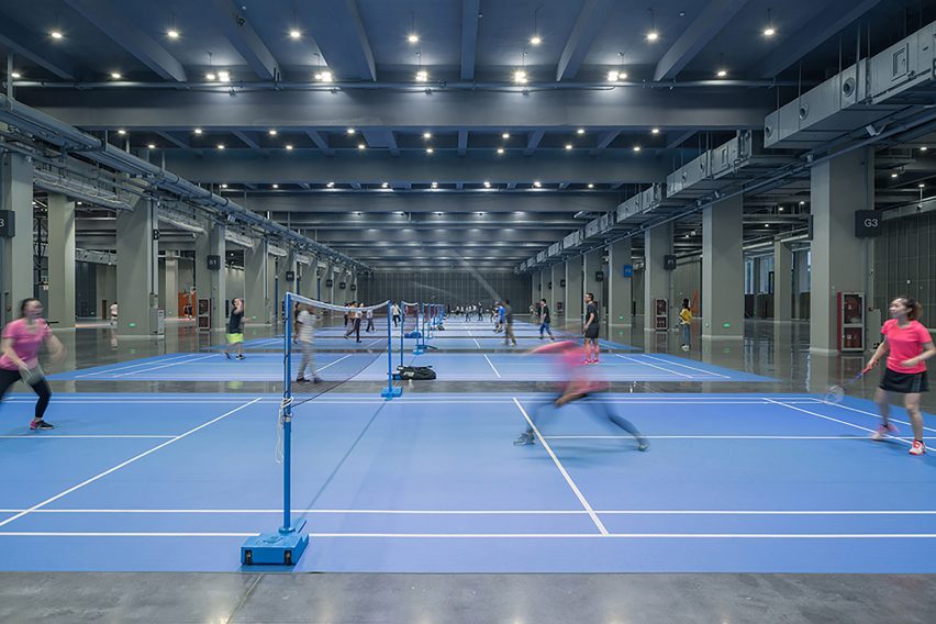 Hangzhou Cloud Town Exhibition Center by Approach Design has a green roof with a running track