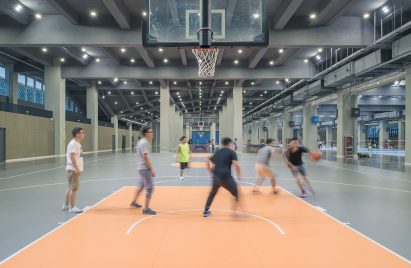 Hangzhou Cloud Town Exhibition Center by Approach Design has a green roof with a running track