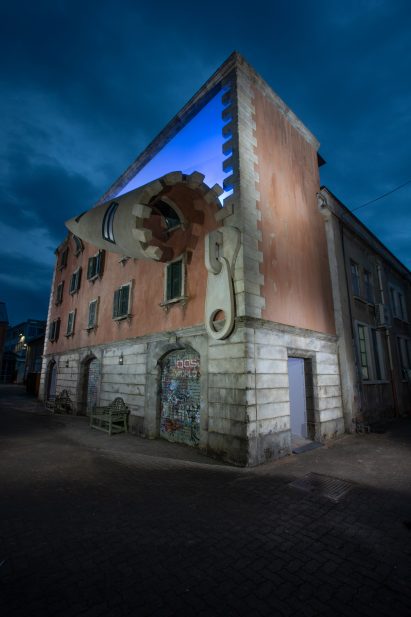 Alex Chinneck unzips a building in Milan's Tortona district