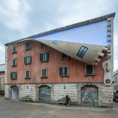 Alex Chinneck unzips a building in Milan's Tortona district
