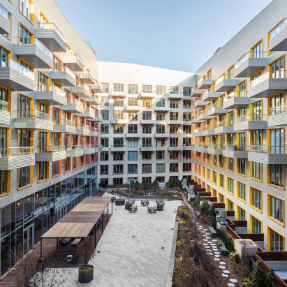 ODA’s The Rheingold in Brooklyn features colourful window frames and “cascading terraces”