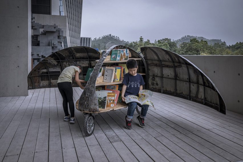 LUO Studio designs a children's microlibrary from recycled abandoned bicycles