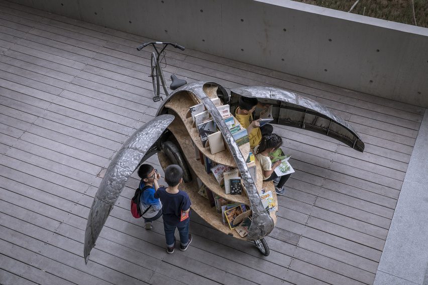 LUO Studio designs a children's microlibrary from recycled abandoned bicycles