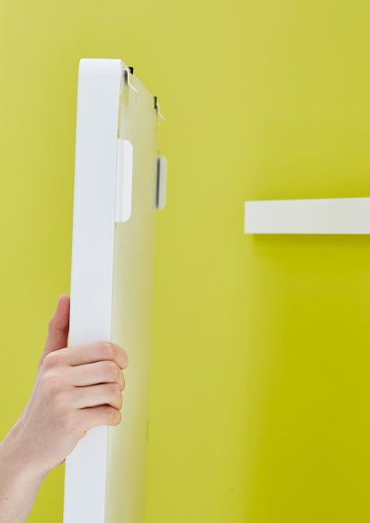 Moving Walls' latest office table doubles up as a wall writing panel
