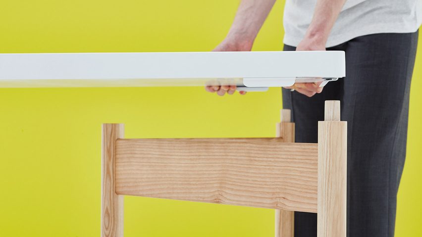 Moving Walls' latest office table doubles up as a wall writing panel