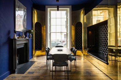 Dining room with golden panelling