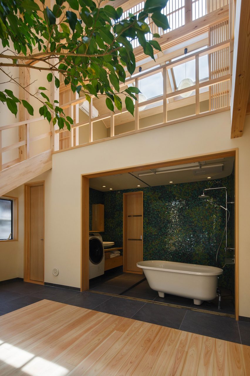 07Beach arrange Kyoto home around glass-fronted bathroom
