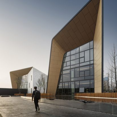 Challenge Design’s metal-clad kindergarten folds around a courtyard