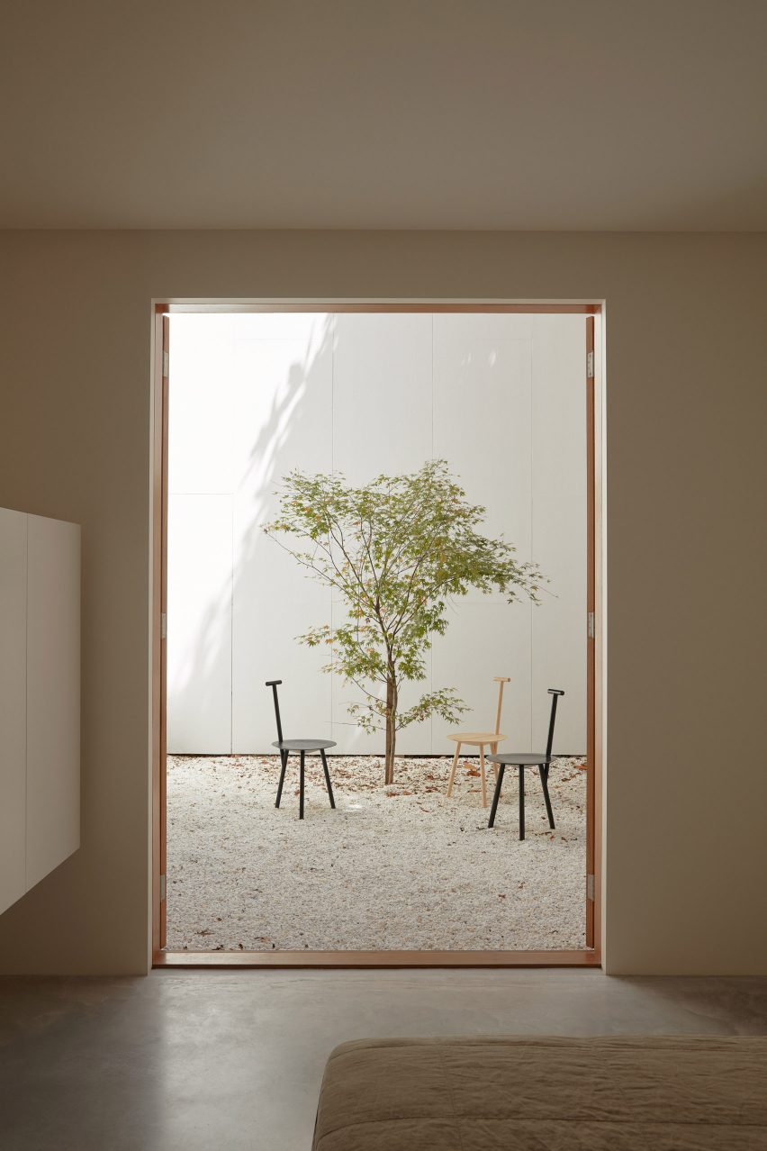 An exposed concrete frame supports this 4.2-metre-wide skinny house in Melbourne designed by Oliver du Puy Architects to feature meditation spaces.