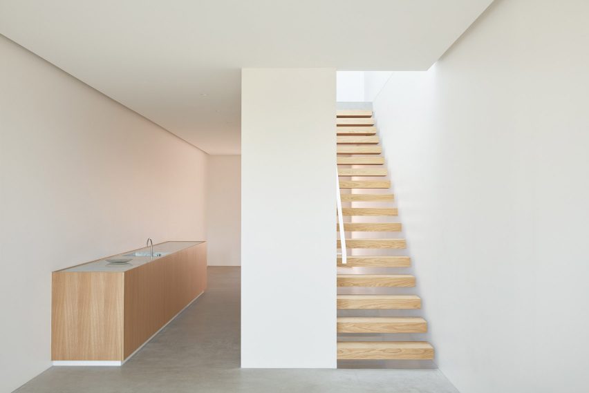 An exposed concrete frame supports this 4.2-metre-wide skinny house in Melbourne designed by Oliver du Puy Architects to feature meditation spaces.