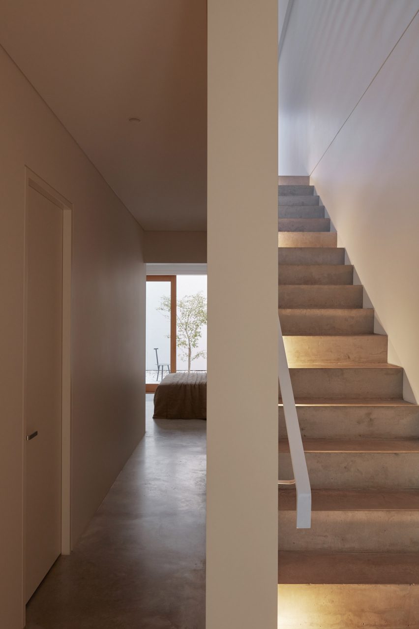 An exposed concrete frame supports this 4.2-metre-wide skinny house in Melbourne designed by Oliver du Puy Architects to feature meditation spaces.