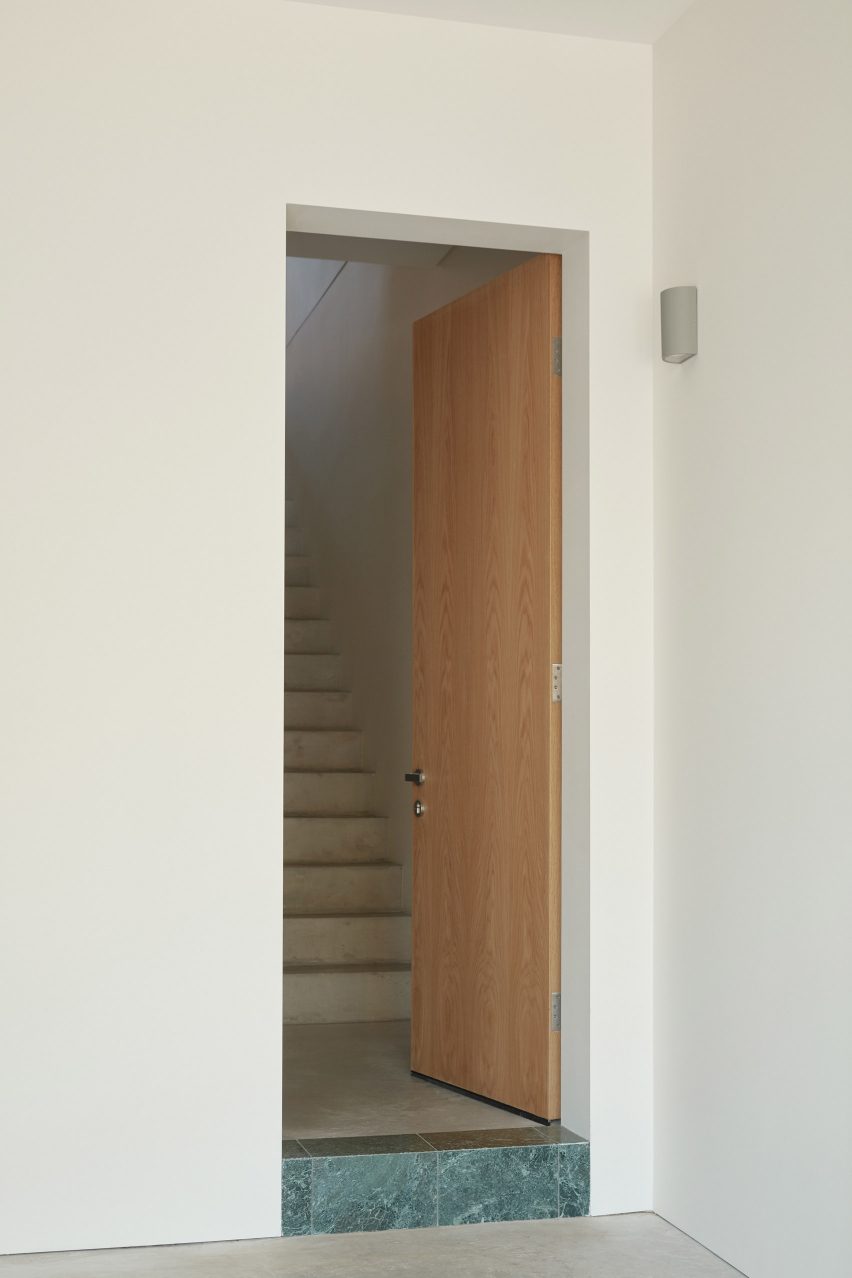 An exposed concrete frame supports this 4.2-metre-wide skinny house in Melbourne designed by Oliver du Puy Architects to feature meditation spaces.
