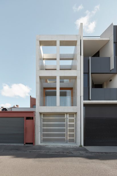 An exposed concrete frame supports this 4.2-metre-wide skinny house in Melbourne designed by Oliver du Puy Architects to feature meditation spaces.