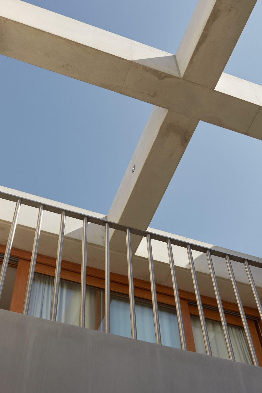 An exposed concrete frame supports this 4.2-metre-wide skinny house in Melbourne designed by Oliver du Puy Architects to feature meditation spaces.