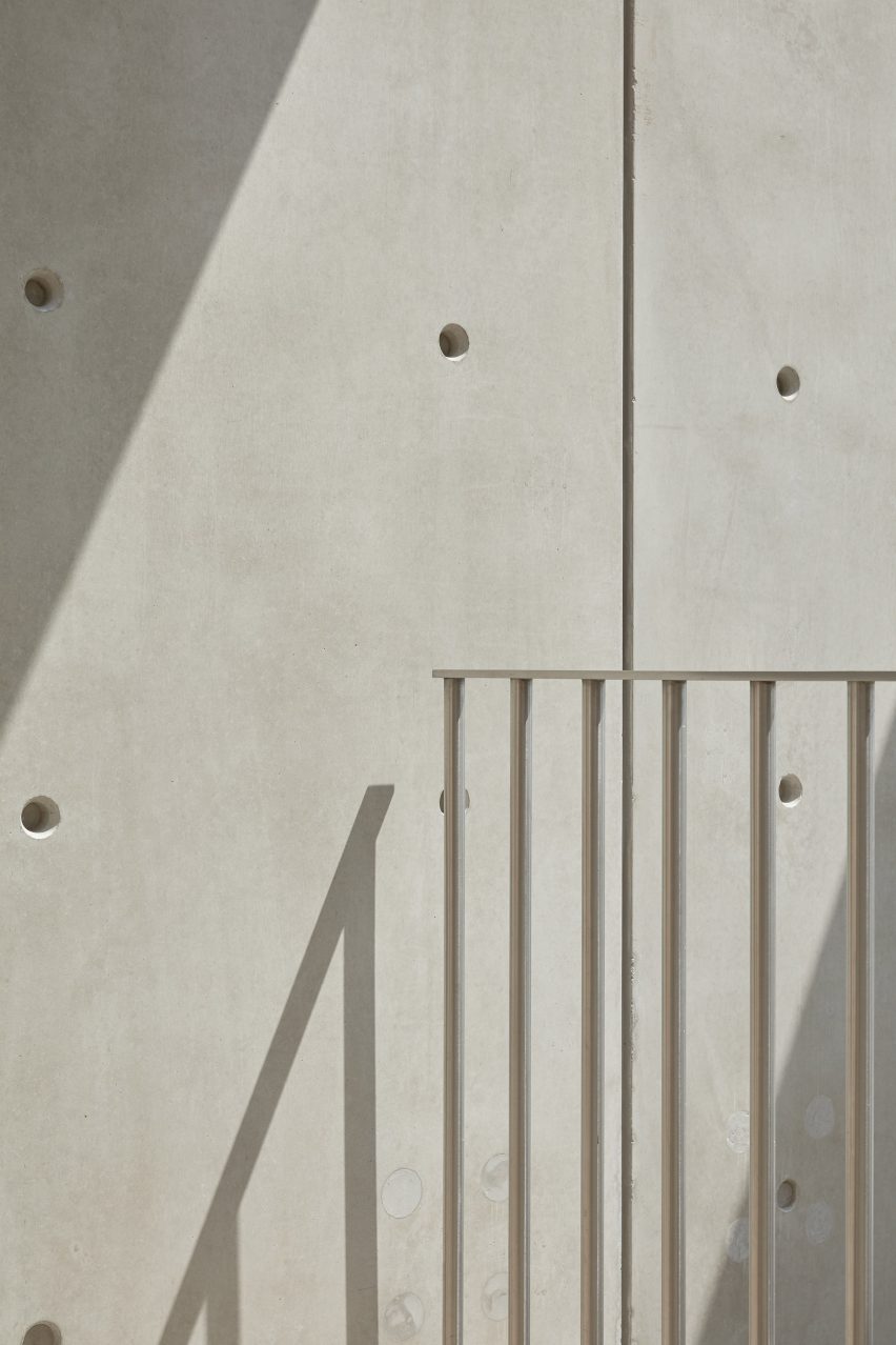 An exposed concrete frame supports this 4.2-metre-wide skinny house in Melbourne designed by Oliver du Puy Architects to feature meditation spaces.