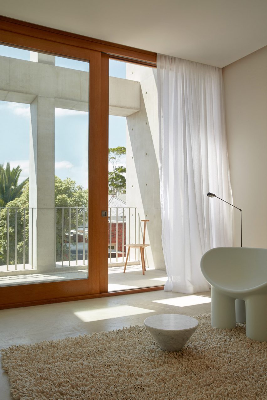 An exposed concrete frame supports this 4.2-metre-wide skinny house in Melbourne designed by Oliver du Puy Architects to feature meditation spaces.