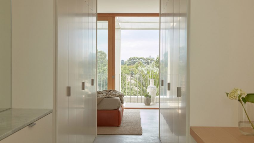An exposed concrete frame supports this 4.2-metre-wide skinny house in Melbourne designed by Oliver du Puy Architects to feature meditation spaces.