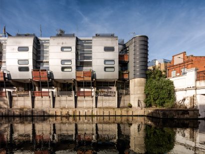 Camden Road Sainsbury's and a residential complex in London built in the High-tech style by architects Grimshaw have been given listed Grade II-listed status.