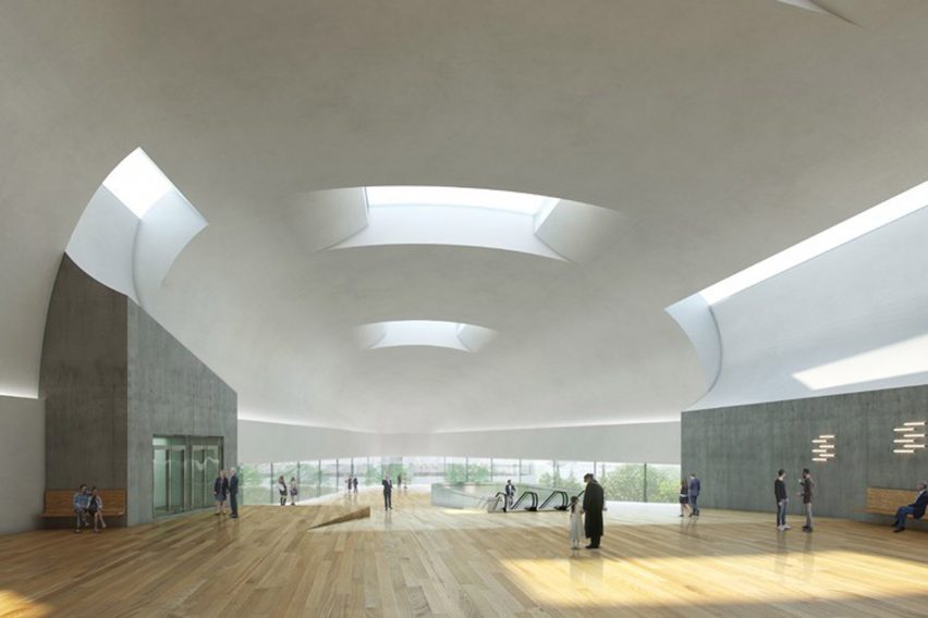 A zinc-clad concert hall by Steven Holl Architects and Architecture Acts will cantilever over the 1960s modernist House of Culture in Ostrava, Czech Republic.