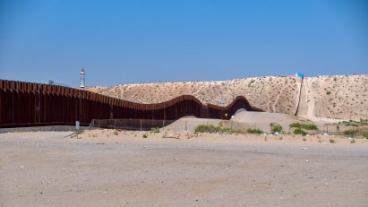 Rael San Fratello slots pink seesaws into US-Mexico border wall