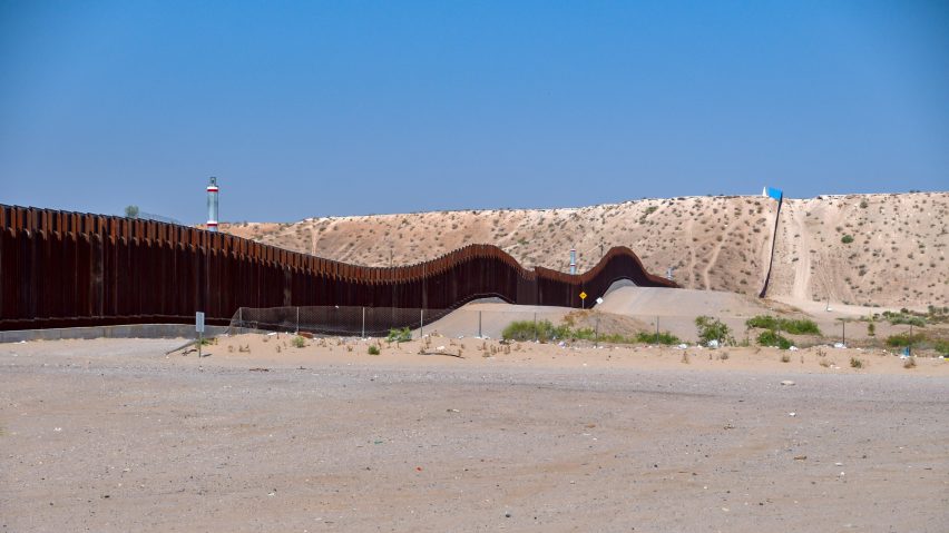 Rael San Fratello slots pink seesaws into US-Mexico border wall