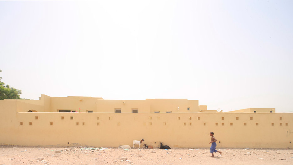 Urko Sanchez Architects builds miniature walled city for orphans